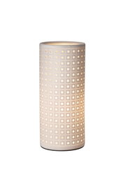 White ceramic cylindrical lamp with perforated pattern emitting warm light for home decor