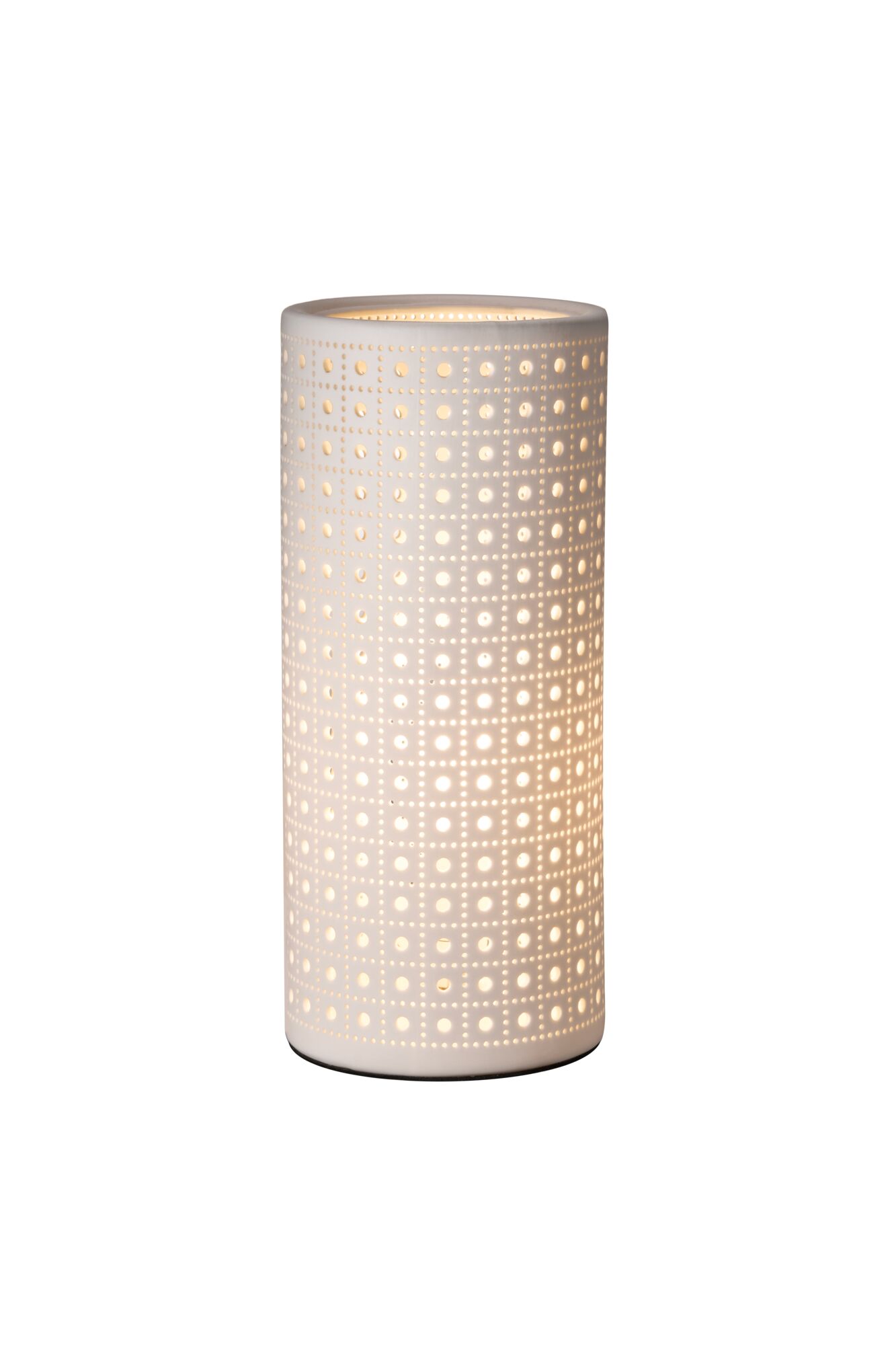 White ceramic cylindrical lamp with perforated pattern emitting warm light for home decor