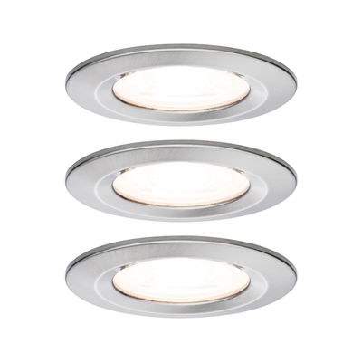 Three round recessed lights in brushed aluminum with warm white LED light for living spaces