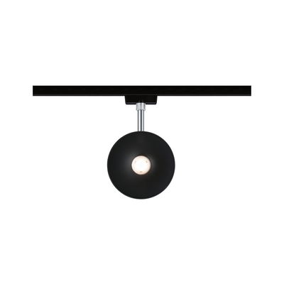 Black round metal LED spotlight on track system for modern indoor lighting solutions