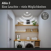 Abia 2 Deckenleuchte in Weiß mit Sensorfunktion über Waschmaschine und Regalen im Hauswirtschaftsraum