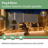 Éclairage LED blanc chaud sous canapé palette en bois pour une ambiance chaleureuse en terrasse