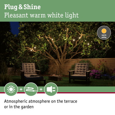 Warm white Plug & Shine LED string lights on garden terrace with comfortable seating