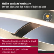 Melira pendant light in brushed gold and matte black with warm white light for stylish modern living spaces