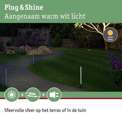 Tuinpad met warm wit licht van slanke buitenlampen voor sfeervolle terras- en tuinverlichting