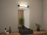 Modern bathroom with black ceramic sink, wooden countertop, and black LED wall light for ambient lighting.