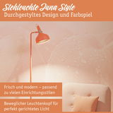 Stehleuchte Juna Style in Orange mit beweglichem Leuchtenkopf für modernes Wohnambiente