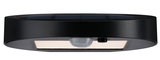 Round black solar LED wall light with motion sensor and warm white light for outdoor use