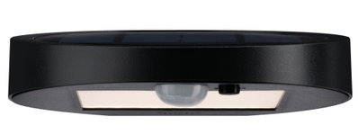 Round black metal solar light with motion sensor and LED for outdoor use and garden lighting