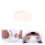 Round white LED ceiling light with mounting clips, ceiling installation, energy-efficient lighting