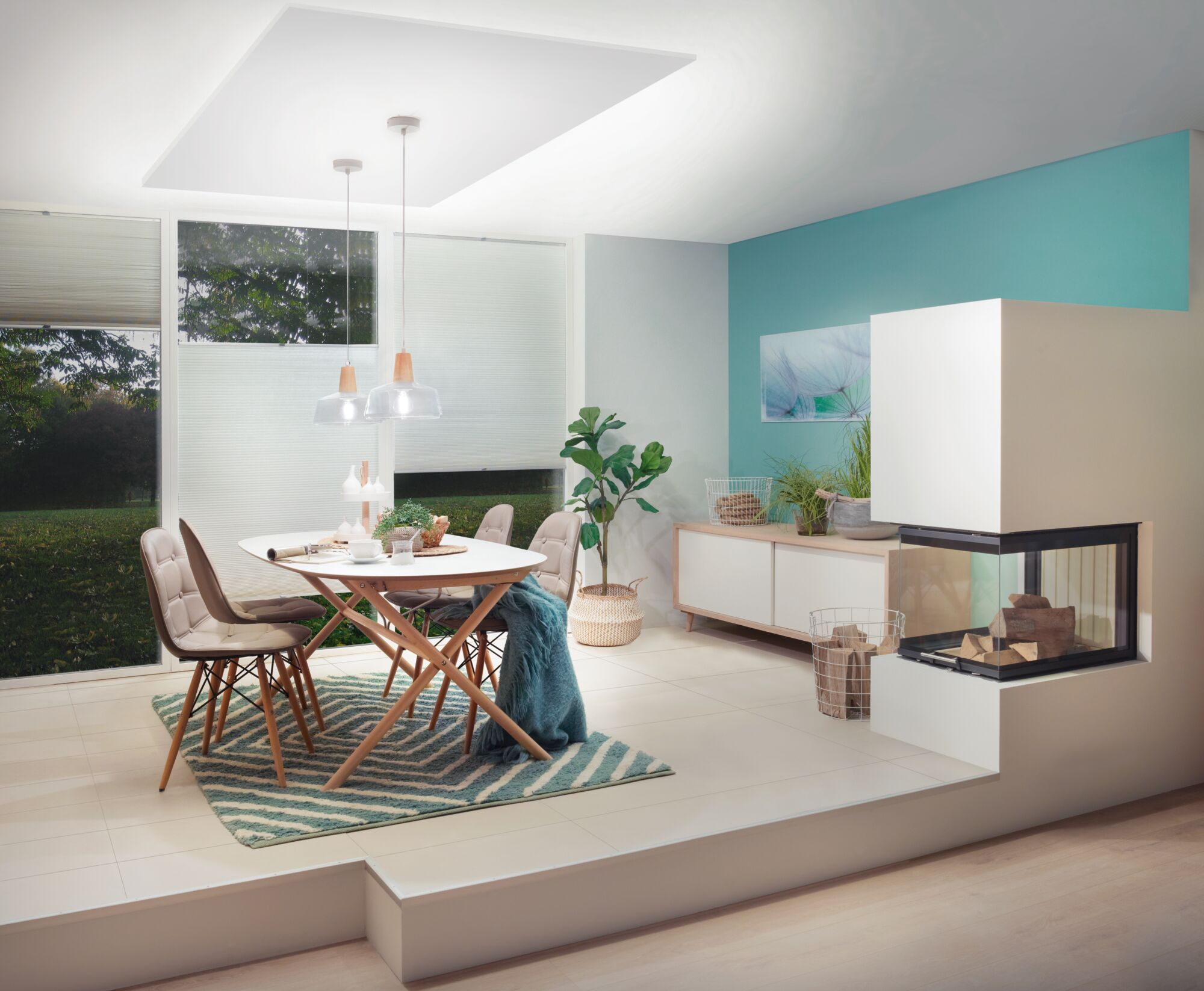 Modern dining room with wooden chairs, white table and two clear pendant lights for living space lighting