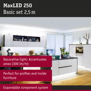 Modern white kitchen with MaxLED 250 LED lighting system and decorative light for furniture profiles