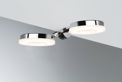 Modern chrome LED wall light with two round warm white lamps for bathroom mirror lighting.