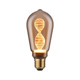 Vintage LED bulb with warm light and twisted filament in amber glass for decorative lighting use