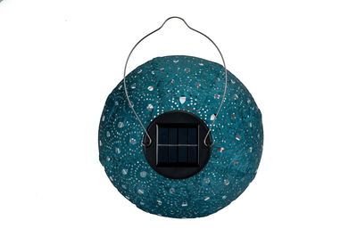 Round solar light with blue metal mesh and stainless steel handle for garden lighting and outdoor decor.