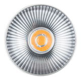 Round spotlight with silver aluminum reflector and orange LED light for accent lighting in interiors