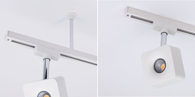 Modern white metal LED ceiling spotlight with square design and track system for accent lighting