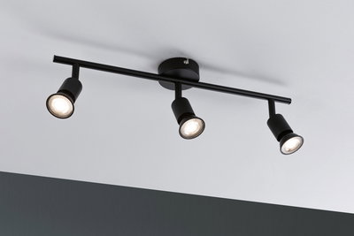 Black ceiling light with three adjustable metal spotlights for modern room lighting