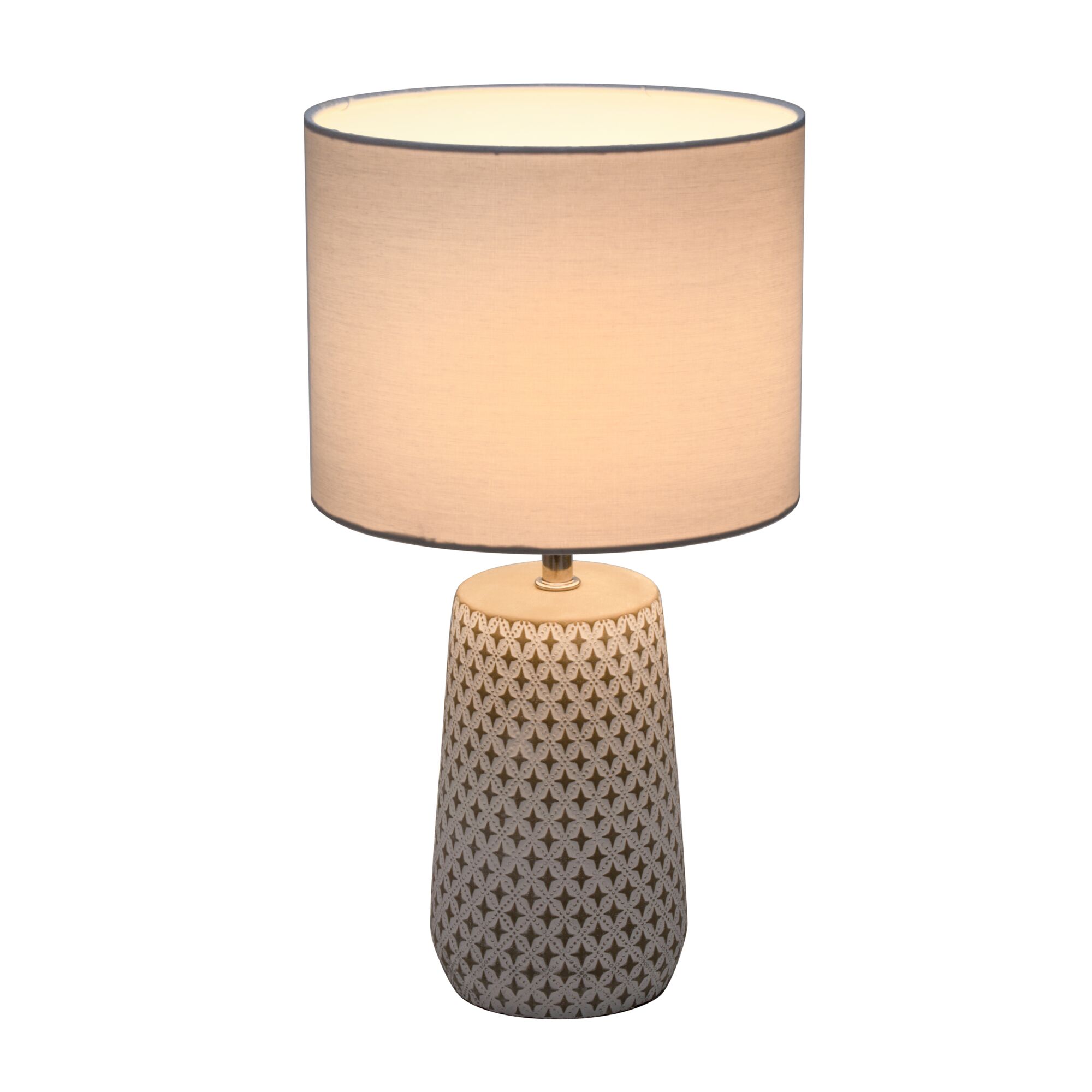 Table lamp with cream fabric shade and beige patterned ceramic base for home lighting decor
