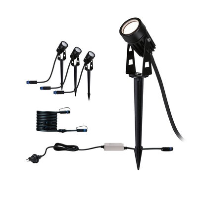 Black LED garden spotlight set with ground spike, cable, and plug for outdoor lighting.