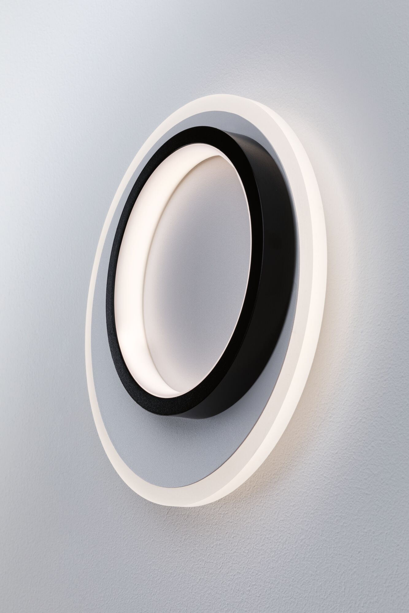 Moderne LED-Wandleuchte aus Metall in Schwarz und Weiß mit indirektem Licht für Wohnräume