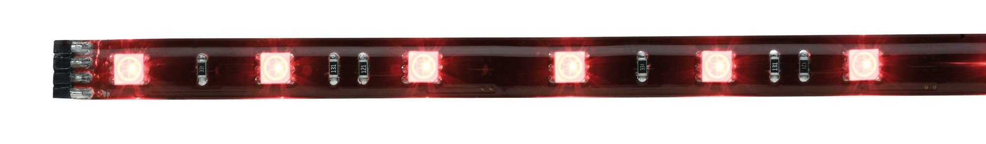 Red LED strip with multiple glowing LEDs on black circuit board for decorative lighting use