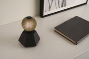 Modern table lamp with black base and gold dot pattern, decorative LED lighting for interiors