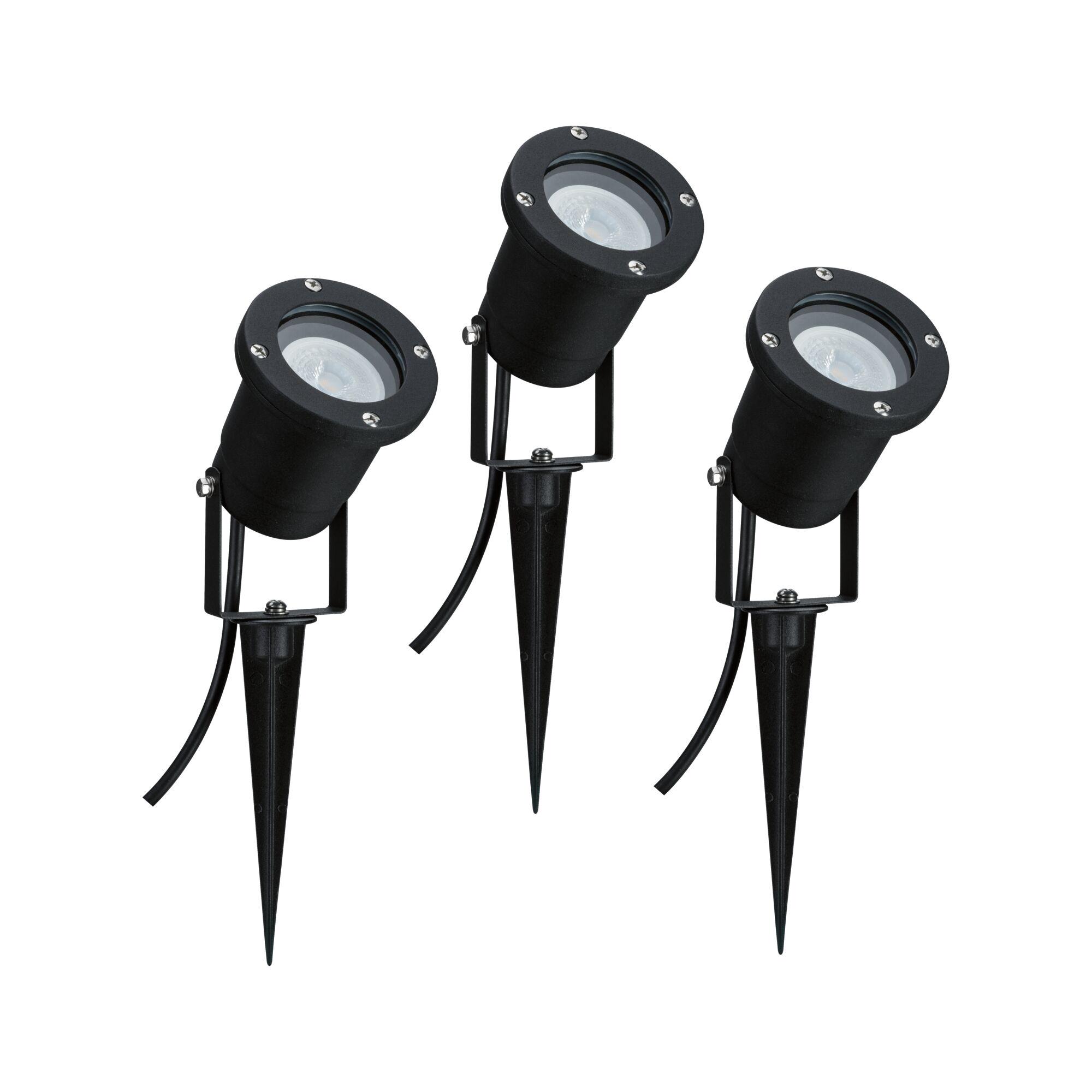 Three black LED garden spotlights with plastic ground spikes for outdoor garden lighting.
