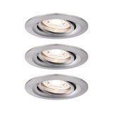 Three round recessed spotlights in brushed silver aluminum with warm white light for indoor use