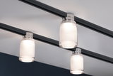 Modern ceiling light with three white glass lamps on black track for stylish room lighting