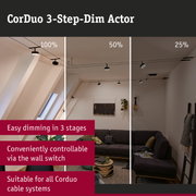 Black CorDuo 3-step dim actor on cable system showing adjustable brightness in modern living room