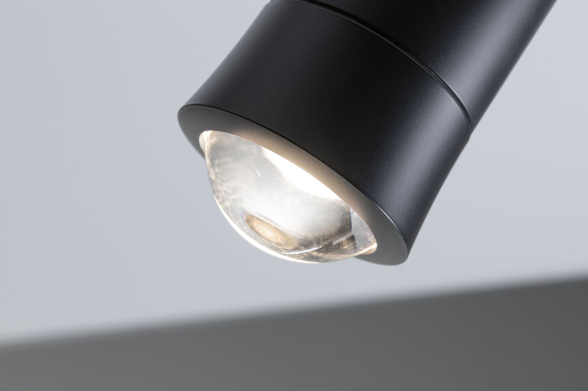 Black metal LED ceiling light with clear glass for modern indoor lighting solutions