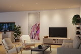 Modern living room with grey sofa, two light wooden armchairs and wooden fabric TV cabinet