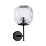Wall lamp with ribbed clear glass and matte black metal holder for modern interior lighting