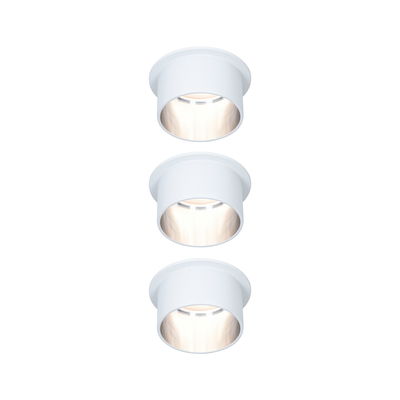 Three white metal LED recessed spotlights with warm white light for modern indoor lighting