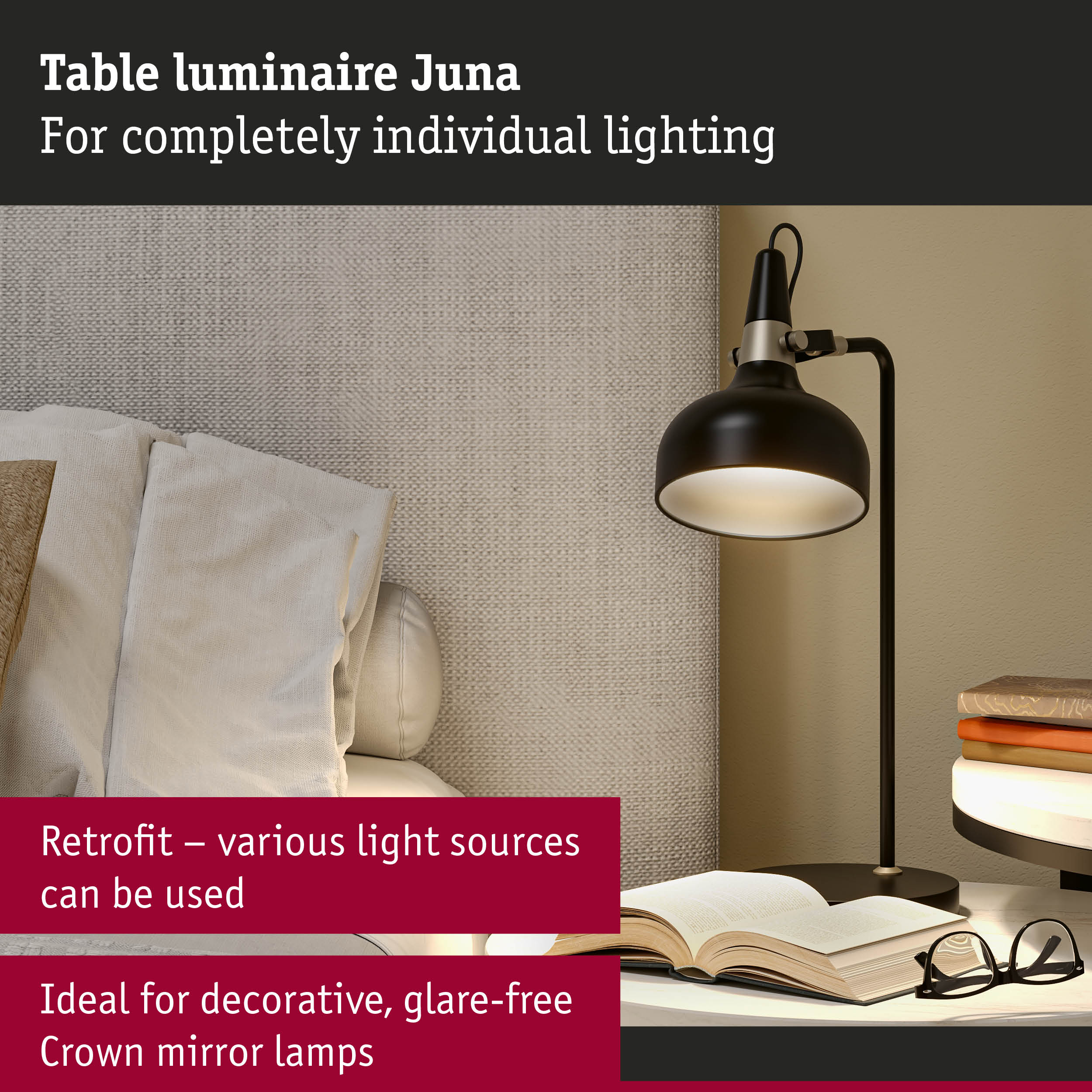 Black metal Juna table lamp with adjustable light beside sofa and books for reading