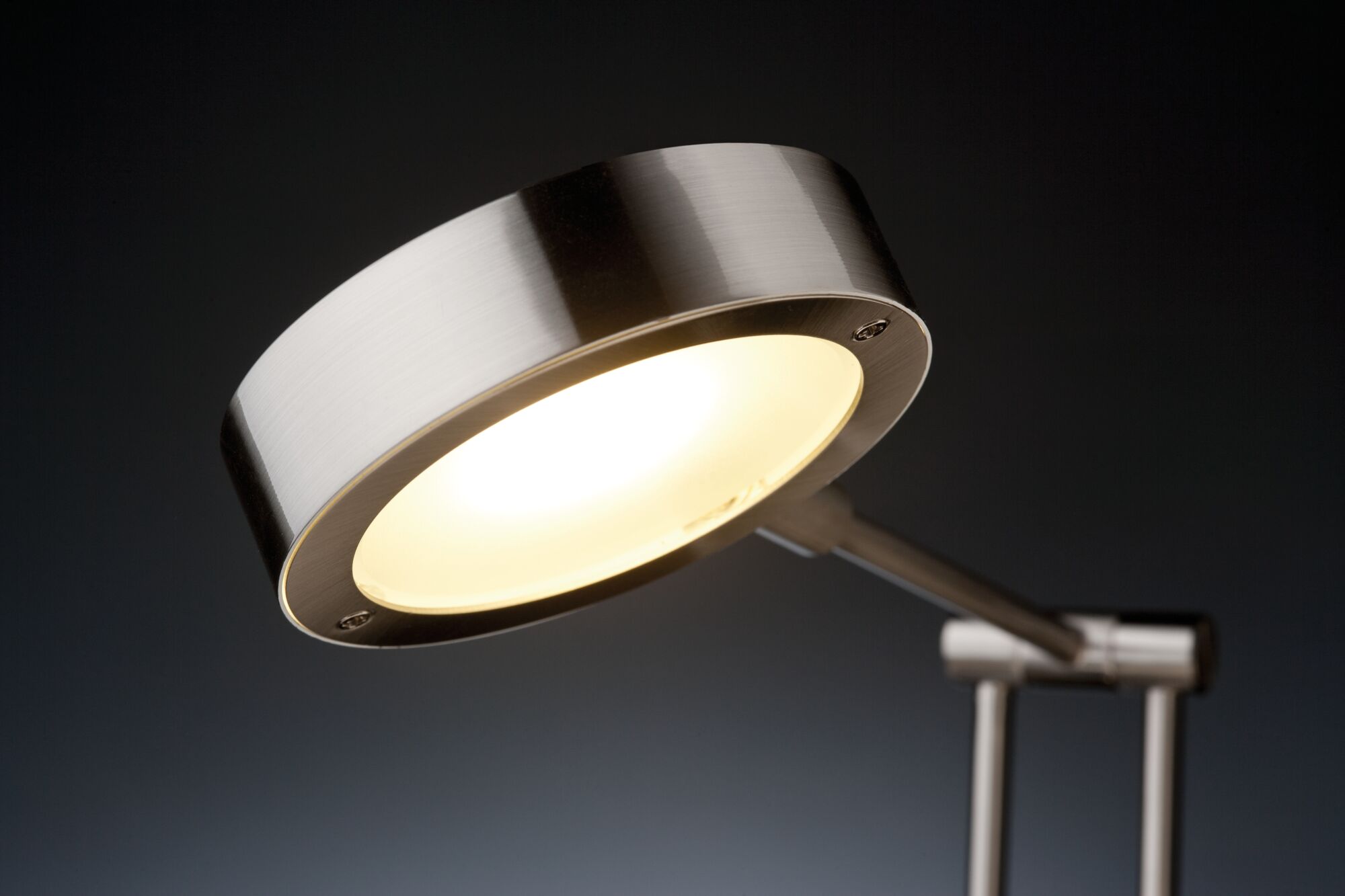 Modern LED desk lamp with brushed stainless steel and warm white light for office and home use