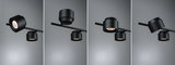 Quatre vues d'un projecteur LED noir en aluminium sur tige pour éclairage intérieur moderne.