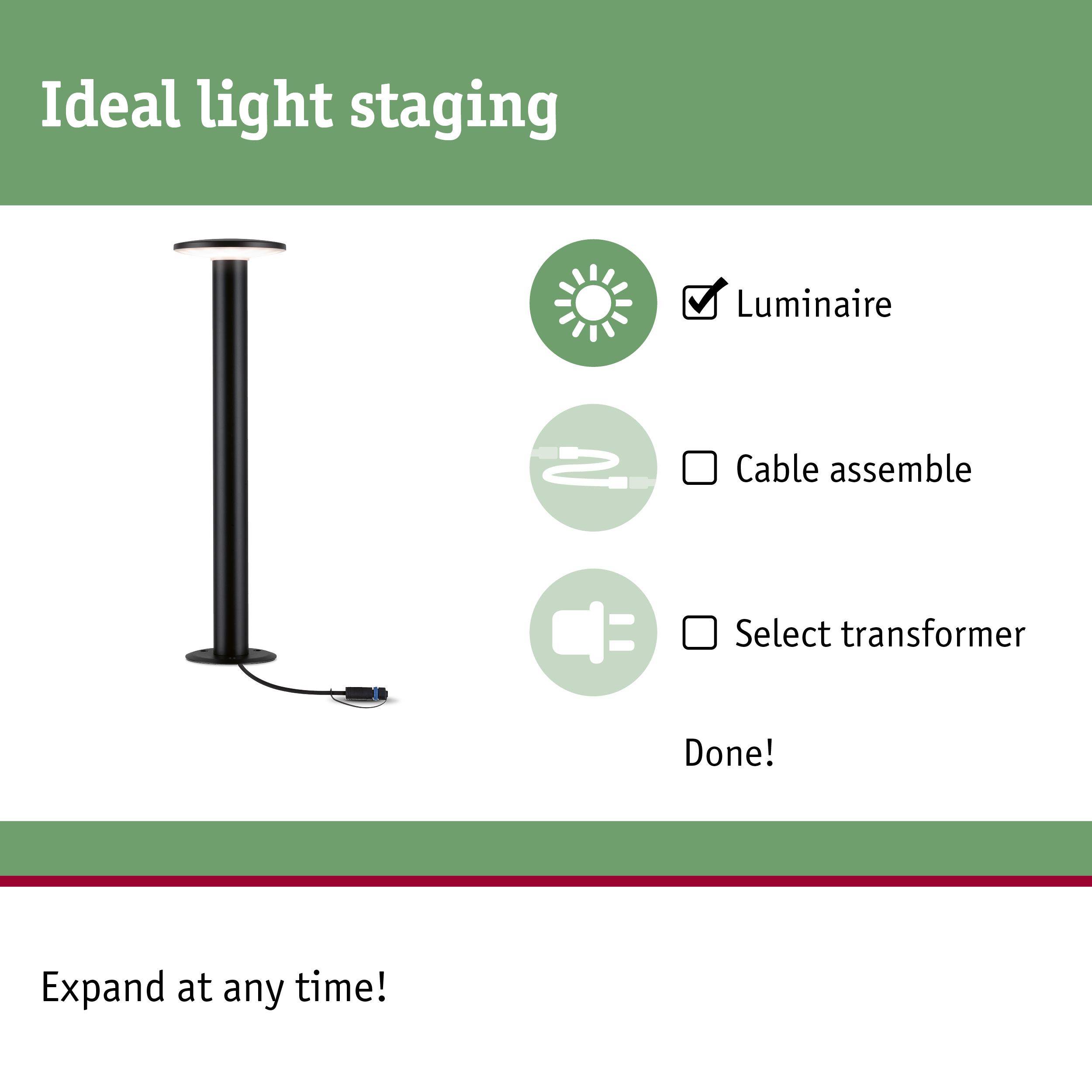 Black LED floor lamp with round light head and cable connection for indoor lighting