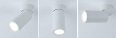 Drie witte metalen LED-plafondspots in verschillende posities voor verstelbare verlichting