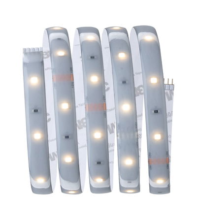 Flexible LED strip with warm white LEDs on white backing tape for versatile lighting solutions.
