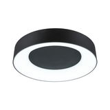 Round black LED ceiling light with white glowing ring, modern design for living spaces