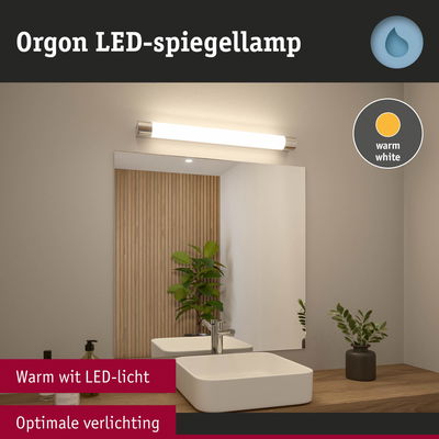 Orgon LED-spiegellamp met warm wit licht boven witte wastafel en houten werkblad in badkamer