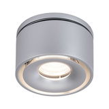 Round ceiling light in matte silver aluminum with warm white LED light for indoor use