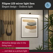 Filigree black LED mirror light Sava with uniform illumination for living room and picture lighting