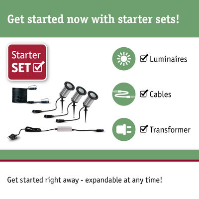Starter set with three stainless steel spike lights, cables, and transformer for garden lighting