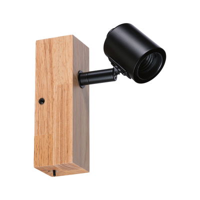 Modern wall light with wooden block and black metal spotlight for focused lighting