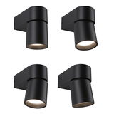 Four black aluminum wall lights with cylindrical design and LED light for modern indoor lighting solutions.