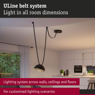 Black ULine Belt System pendant light in modern living space for versatile room lighting solutions