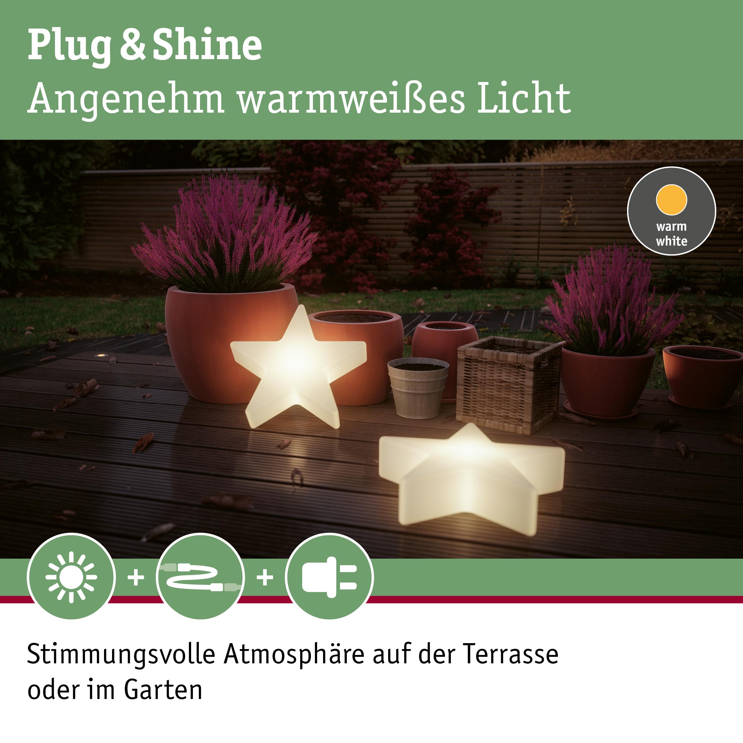 Warmweiß leuchtende Sternlampen aus Kunststoff auf Terrasse mit Blumentöpfen für Gartenbeleuchtung